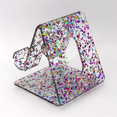 Global Phone Stand Multi Colored confetti-patterned acrylic design, fits most smartphones, durable and easy to maintain.