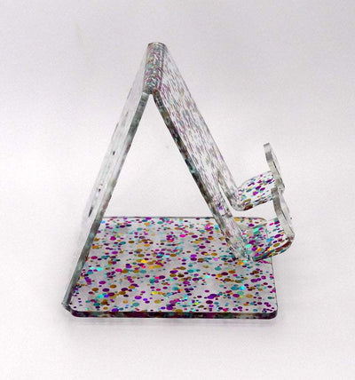 Global Phone Stand Multi Colored confetti-patterned acrylic design, fits most smartphones, durable and easy to maintain.
