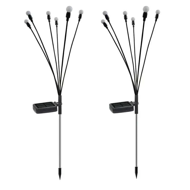 Solar LED Butterfly and Bee Firefly Garden Lights with colorful glowing butterflies on stakes for outdoor decoration at night