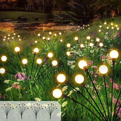 Solar LED Butterfly and Bee Firefly Garden Lights with colorful glowing butterflies on stakes for outdoor decoration at night
