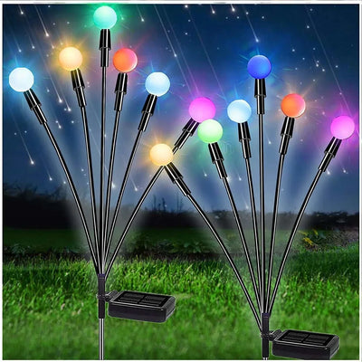 Solar LED Butterfly and Bee Firefly Garden Lights with colorful glowing butterflies on stakes for outdoor decoration at night